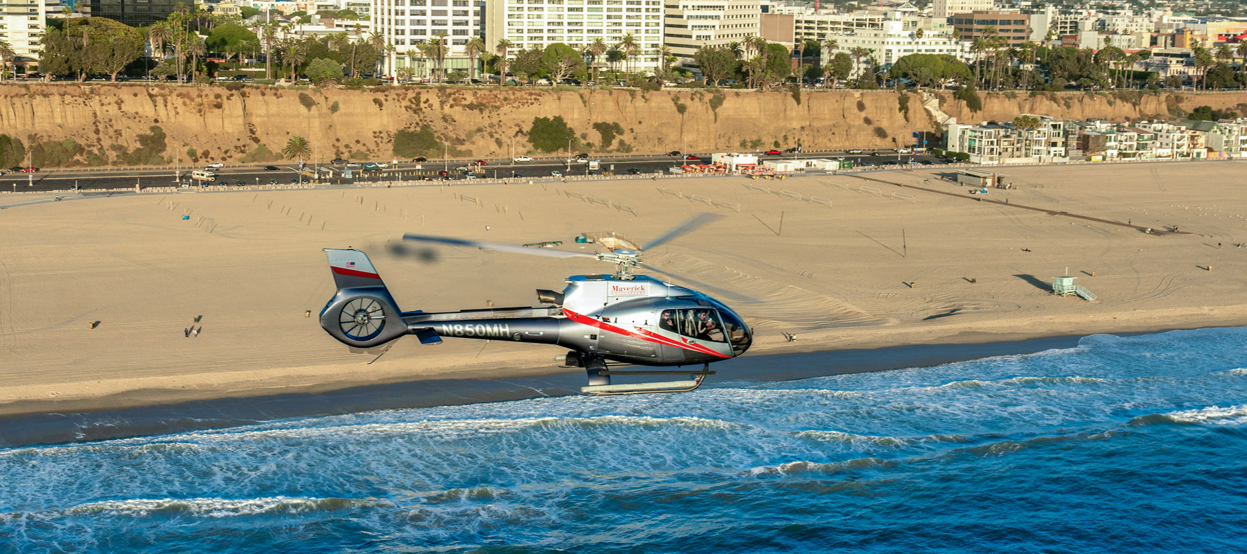 Helicopter flight above Santa Monica Beach and the Pacific Ocean