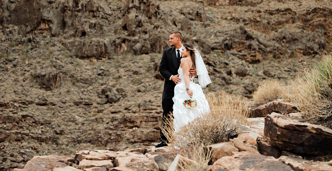 A couple celebrating a destination wedding at Grand Canyon