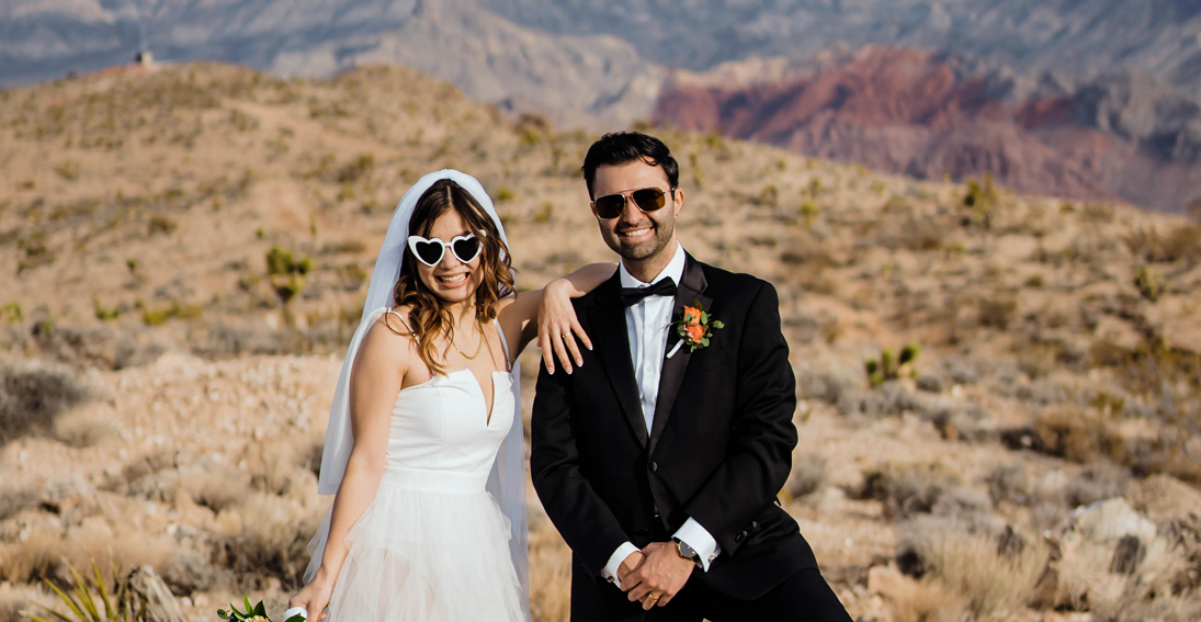 Cherished moments at a romantic private landing wedding with stunning Strip and desert views