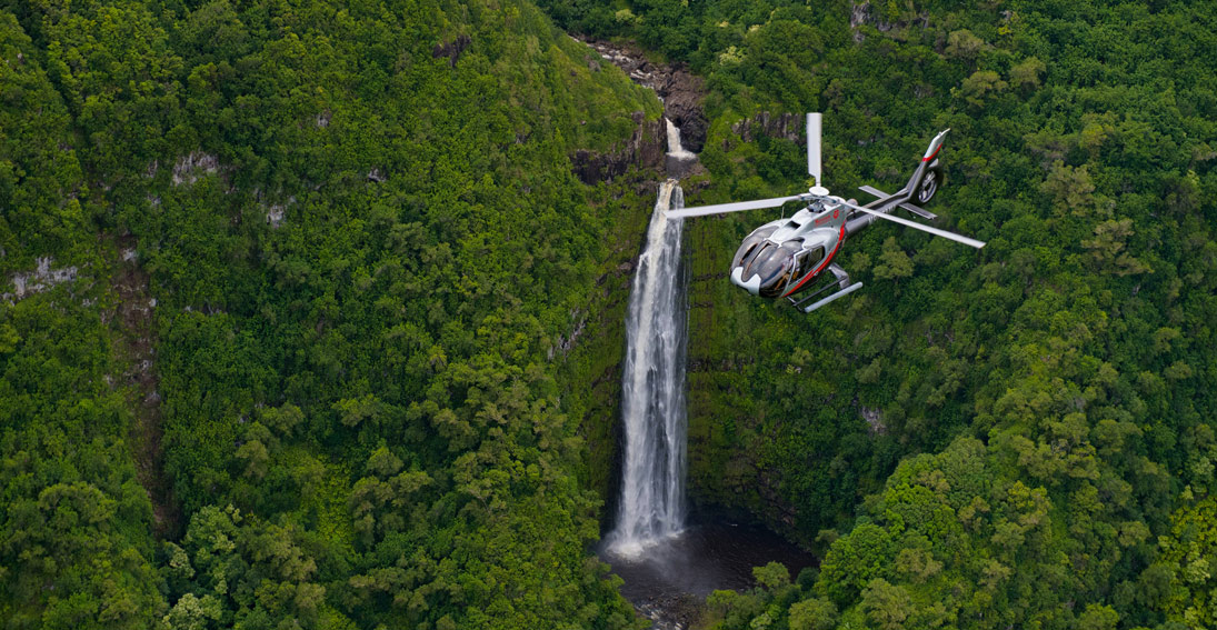 Flowing Maui waterfalls create a stunning backdrop to your helicopter wedding